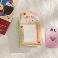 Detail of cute puppy photo card holder featuring yellow checkerboard pattern and window - Yellow