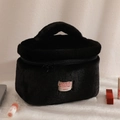 Détail de la trousse de maquillage en peluche noire avec double fermeture éclair - Noir