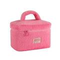 Detailed macro view of plush pink makeup bag featuring dual zippers and sturdy handle - Rose Red