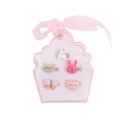 Close-up of five cartoon rings including unicorn and rainbow shapes in a cupcake box - Cat-Ice Cream