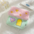 Close-up of house-shaped plush card holder with heart embroidery and soft pastel colors - Green Shell