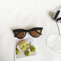 Occhiali da sole retrò cat-eye con montatura nera e lenti marroni protezione UV400 - Marrone Scuro