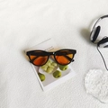Retro-Cat-Eye-Sonnenbrille mit schwarzem Rahmen und orangefarbenen Gläsern im Vintage-Stil - Schwarzorange