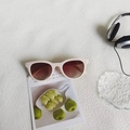 Retro cat-eye sunglasses with cream white frames and gradient reddish-brown lenses - Off White