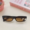 Retro black square sunglasses with amber lenses on a pink aesthetic background - Dark Brown