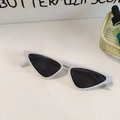 Retro white cat-eye sunglasses with dark grey lenses on a minimalist background - Triangular Cat Eye Style (White 12)