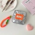 Detail of silver quilted mini pouch with orange ruffle tag and colorful rope handle - Orange