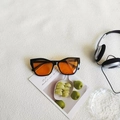 Retro black square cat-eye sunglasses with vibrant orange lenses and color-block frame - Black Frame Orange Lens