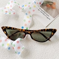 Retro cat eye sunglasses featuring leopard print frames and dark grey polarized lenses - Leopard Print