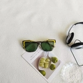 Retro cat-eye sunglasses with yellow and tortoiseshell frames and dark green lenses - Striped Gray Lens