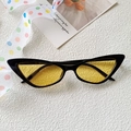 Retro cat-eye sunglasses with glossy black frames and transparent yellow lenses - Black Frame Yellow Lens