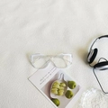 Retro cat-eye sunglasses with transparent frames and white top-rim stripe accents - Transparent White