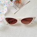 Retro cat-eye sunglasses with cream white frame and amber lenses for a vintage look - Off White