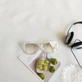 Retro cat-eye sunglasses with translucent white frames and light brown lenses - Transparent Light Silver