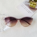 Cat eye glasses featuring transparent pink purple frames and gradient orange lenses - Purple Pink