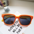 Polarized kids sunglasses in vibrant orange and yellow color block with smile icon - Orange (Orange Frame Yellow Legs Smile)