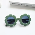 Stylish green flower shaped polarized sunglasses for kids providing full UV400 protection - Green