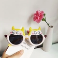 Pink cartoon polarized sunglasses for kids with yellow horn details and round grey lenses - Yellow