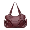 Deep red pebbled leather bucket bag with silver star studs and crossbody strap - Burgundy