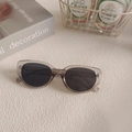 Retro grey transparent square sunglasses with black lenses on a stylish tabletop - Grey 9-Grey Translucent Cat Eye Vintage Sunglasses