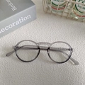Retro grey semi-transparent round frame sunglasses on a stylish white textured background - Grey 11-Grey Translucent Vintage Round Frame