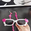 White kids sunglasses with pink elephant heart charms and matching pink chain strap - White