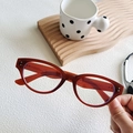 Occhiali da sole cat-eye marrone rosso traslucido con eleganti rivetti in argento - Montatura Tè Lente Chiara