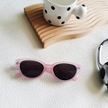 Occhiali da sole cat-eye rosa traslucidi con lenti scure e dettagli in metallo - Rosa