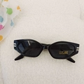 Kids vintage narrow cat eye sunglasses in black with UV400 protection and metal accents - Bright Black