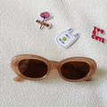 Lunettes de soleil ovales rétro avec monture caramel translucide et verres bruns - Thé Gelée