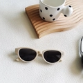 Retro cat-eye sunglasses with beige frame and dark lenses featuring metal rivet details - Off White