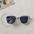 Fashionable white thick-framed sunglasses with dark lenses and gold metal nose bridge - White
