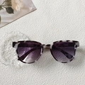 Champagne tortoiseshell sunglasses with purple gradient lenses and gold bridge detail - Milk Cow Pattern