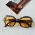 Geometric sunglasses with transparent grey marble frame and vibrant orange lenses - Transparent Grey Yellow Lens