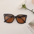 Square oversized black frame sunglasses with amber lenses and golden star accent - Dark Brown