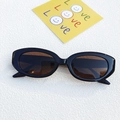 Retro ovale Sonnenbrille mit glänzend schwarzem Gestell und braunen Gläsern - Dunkelbraun