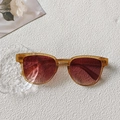 Champagne amber square sunglasses with reddish-brown gradient lenses on white textured background - Champagne