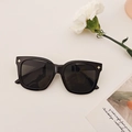 Chic black square oversized sunglasses with gold star accents and dark tinted lenses - Black and Gray