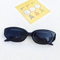 Schwarze ovale Retro-Sonnenbrille mit dickem Rahmen und dunklen Gläsern im Vintage-Stil - Schwarz und Grau