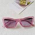 Retro cat-eye sunglasses with translucent pink frames and purple tinted lenses - Rose Purple