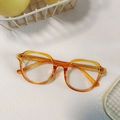 Occhiali da sole cat eye arancioni traslucidi con montatura geometrica alla moda - Cornice Tonda Geometrica Arancione Luminoso (024)