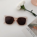 Lunettes de soleil carrées oversize avec monture rose translucide et verres marron - Champagne