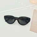 Occhiali da sole futuristici cat-eye neri lucidi con montatura ovale sport e moda - Nero e Grigio