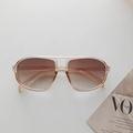 Retro pilot sunglasses featuring transparent champagne frames and brown gradient lenses - Champagne