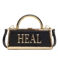 Black woven box handbag with golden HEAL logo and metallic top handle for women - Black