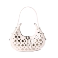 Chic white crescent shoulder bag with metallic stud embellishments and slim straps - White