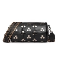 Black cylinder crossbody bag with silver hexagonal rivets and wide LOVE strap - Black