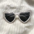 White heart-shaped sunglasses with love you pearl decor and dark tinted lenses - LOVEYOU