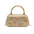 Champagne gold pebble textured evening bag with beaded metal handle and chain strap - Gold