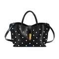 Elegante borsa in pelle nera con borchie di perle bianche e fibbia dorata su fondo bianco - Nero